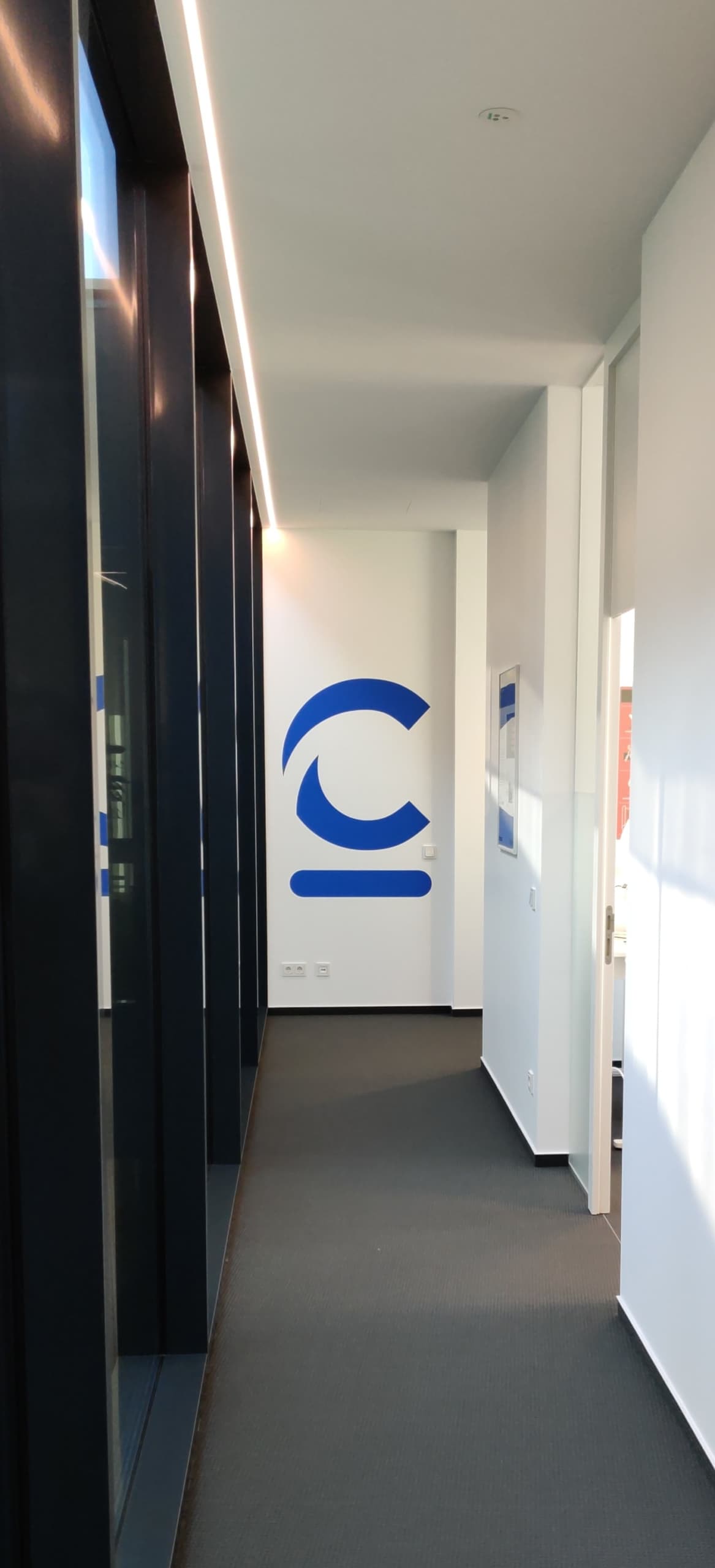 Cloudflight C on the wall in the office in Ried